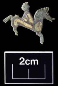 Enamelled copper alloy horse and rider broach - Albion Archaeology excavation in Fenstanton 2017-18